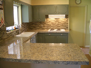 Granite countertop and glass tile kitchen backsplash tile installation in Fort Collins, Colorado