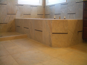Porcelain and glass master bathroom tile installation in Windsor, Colorado