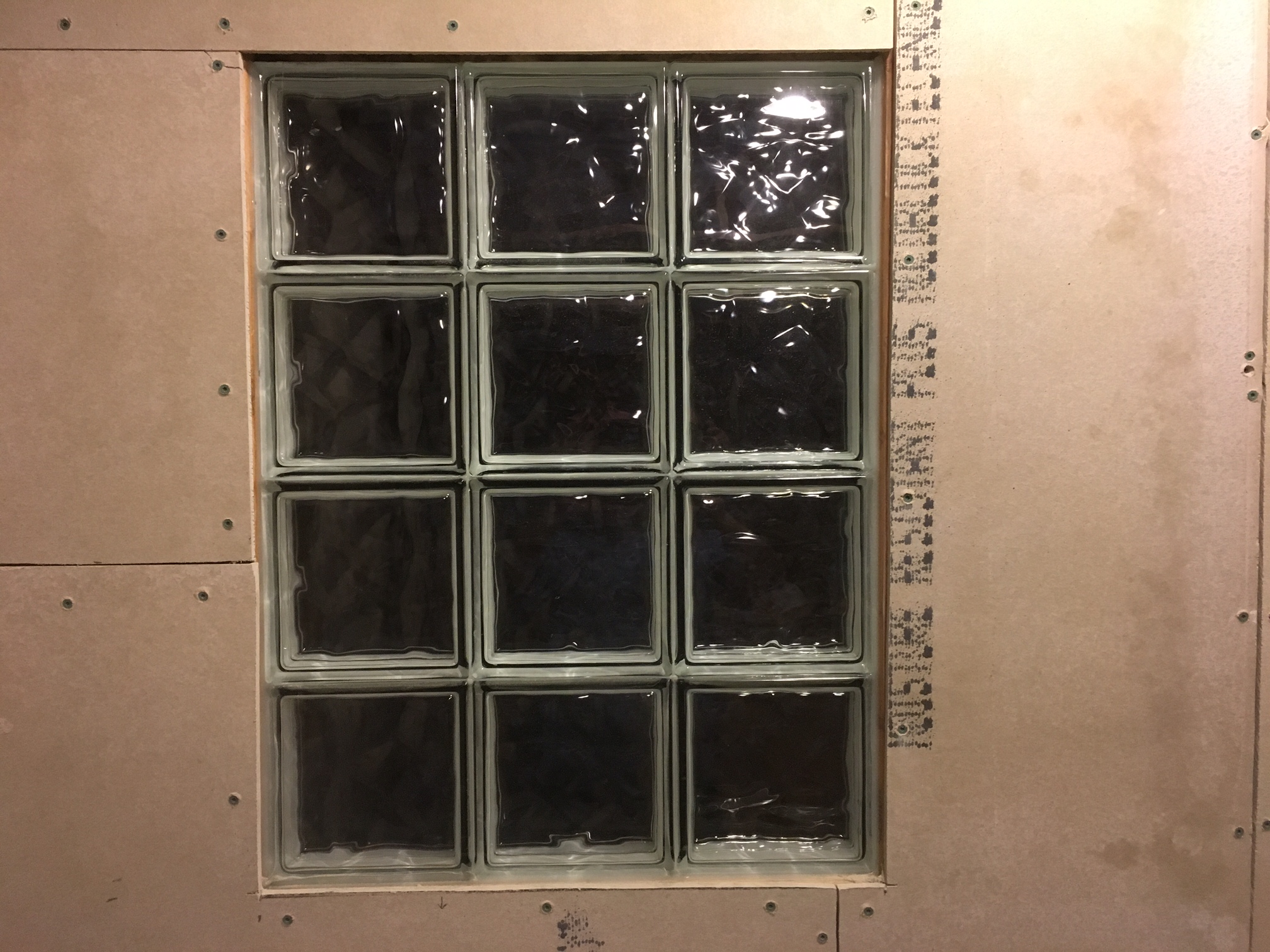 Installing Redgard on Shower Walls for Tile