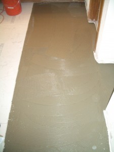 Installing thinset beneath backerboards