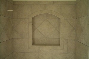 Ceramic niche with arched top and frame. On-point tile throughout Ceramic niche with arched top and frame. On-point tile throughout