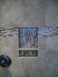 Porcelain niche with shelf and glass / travertine liner Porcelain niche with shelf and glass / travertine liner