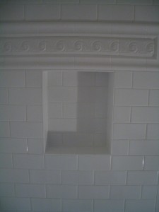 Niche in subway tile shower with listello above Niche in subway tile shower with listello above