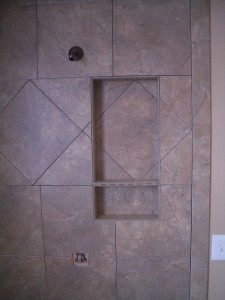 Porcelin niche with shelf and on-point row running throughout Porcelin niche with shelf and on-point row running throughout
