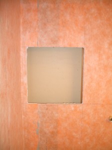Marking and cutting the opening for a tiled shower niche Marking and cutting the opening for a tiled shower niche