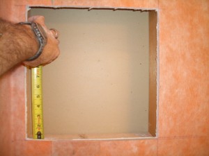 Top and bottom framing for tiled shower niche Top and bottom framing for tiled shower niche