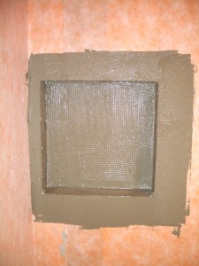 Combing thinset into and around niche for kerdi Combing thinset into and around niche for kerdi
