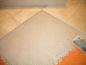 Tile being installed over Ditra
