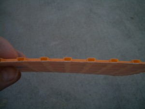 Cross-section view of Ditra's dovetailed cavities