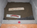Installing the mud deck with a laticrete linear drain