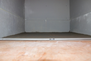 Flat slope with a laticrete linear drain